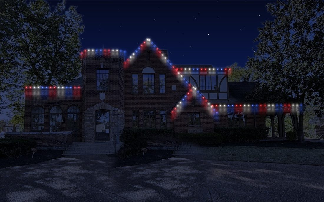 A brick house with red, white and blue C9s.