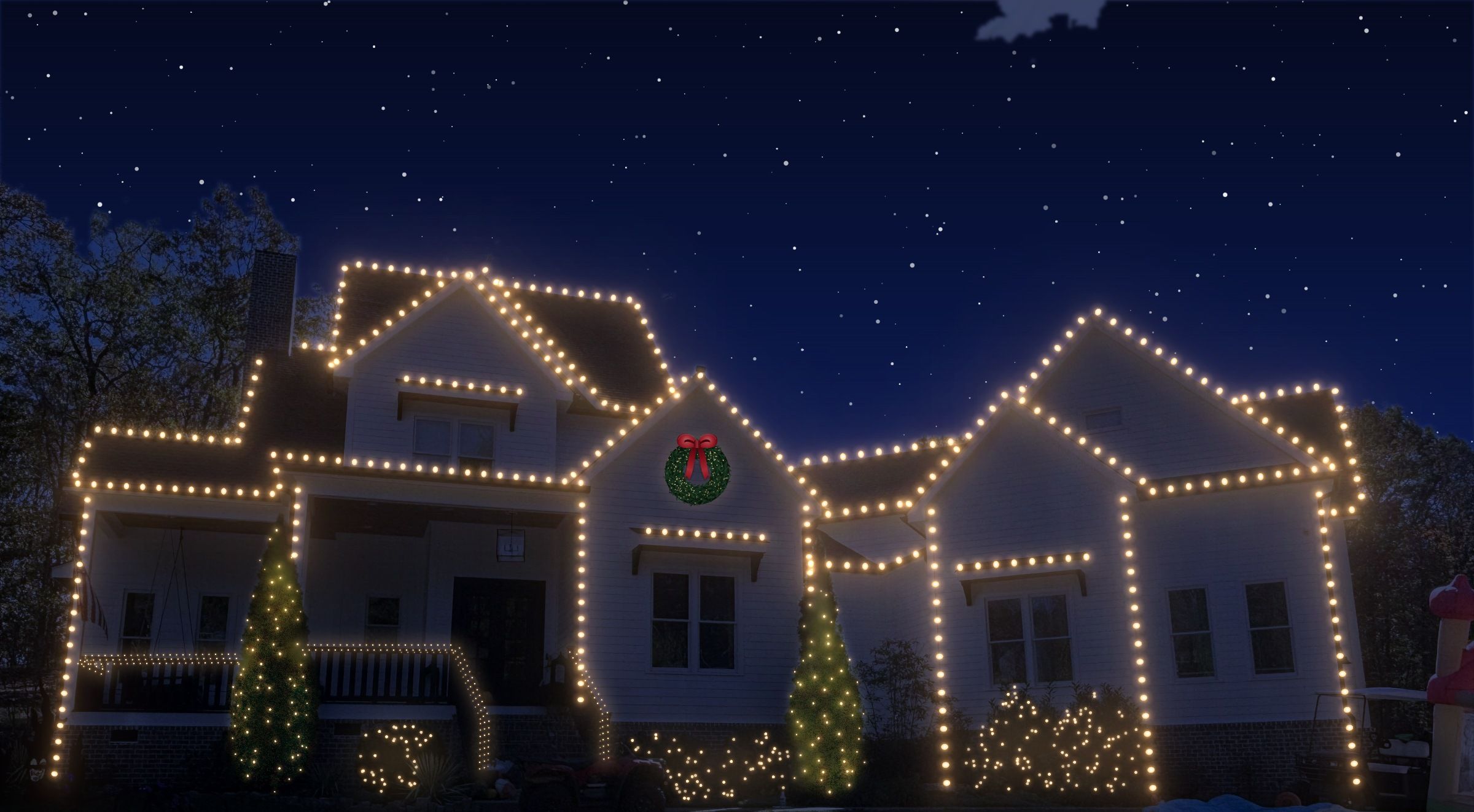 A large white house at night outlined in warm white C9 lights, with lit trees and a wreath, drawn in Rooflit.